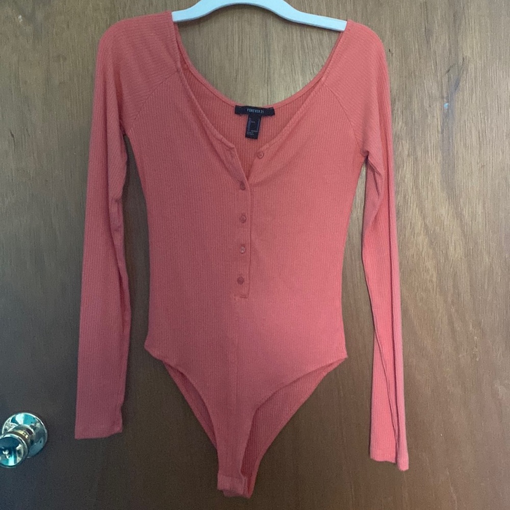 A bodysuit from forever 21 size small the color is coral